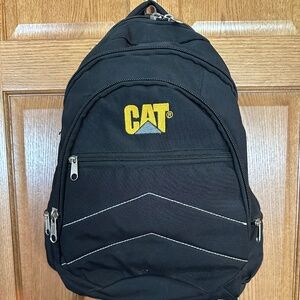 CAT brand black and gold backpack-new without tags